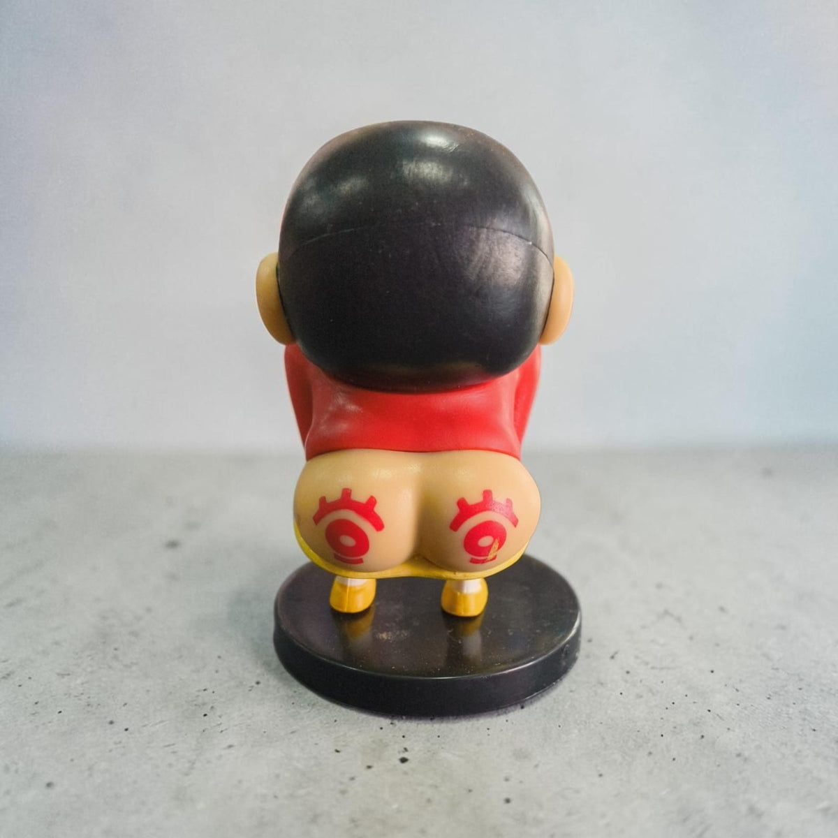 Shinchan Standing Figurine – Cute Cartoon Collectible (9 CM)