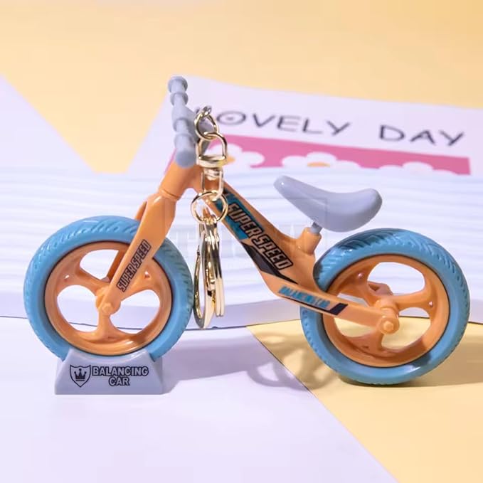 3D Design Base Stand Cycle Keychain with Movable Sliding Wheel.(Assorted Colours)