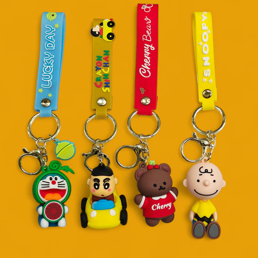 Cute Cartoons Silicon Keychains... Shinchan, Doremon, Snoopy and Cherry Bear. (Assorted).
