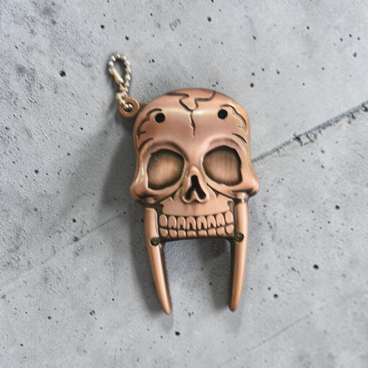Skull Fang Metal Lighter – Refillable Collectible (Bronze)