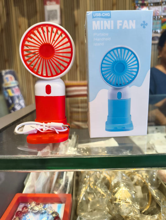 "USB Rechargeable Mini Fan – Portable Handheld Cooling Fan for Home, Office & Travel" (Assorted Colours)